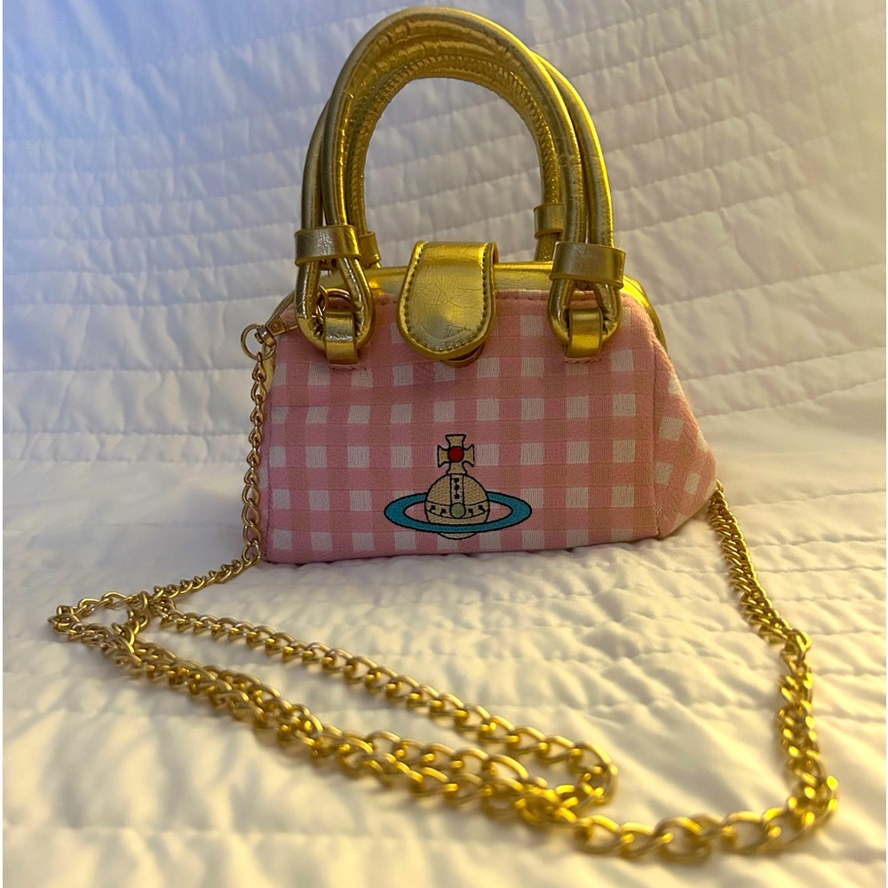 Westwood *small* bag/clutch comes with gold chain perfect to detach or attach!